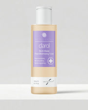 A bottle of Clarol Birch Water Pore-Minimising Toner for acne-prone skin, featuring a lavender purple label and a white cap, set against a clean light gray background.