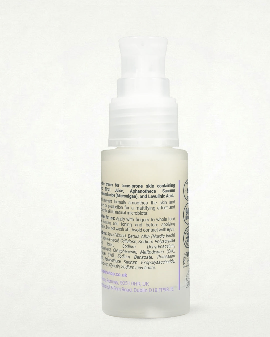 A bottle  of Clarol Nordic Birch & Japanese Algae Mattifying Primer for oily and acne-prone skin with a white pump dispenser, showing the back label with ingredient, instructions, 94% natural icon, PETA animal cruelty-free icon, and made in Britian icon; set against a plain white background.