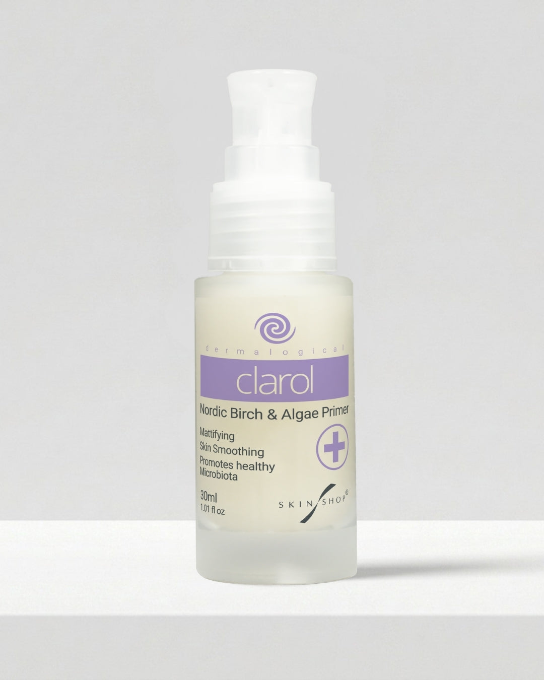 A bottle of Clarol Nordic Birch & Algae Primer for oily and acne-prone skin with a white pump dispenser, set against a neutral light gray background.