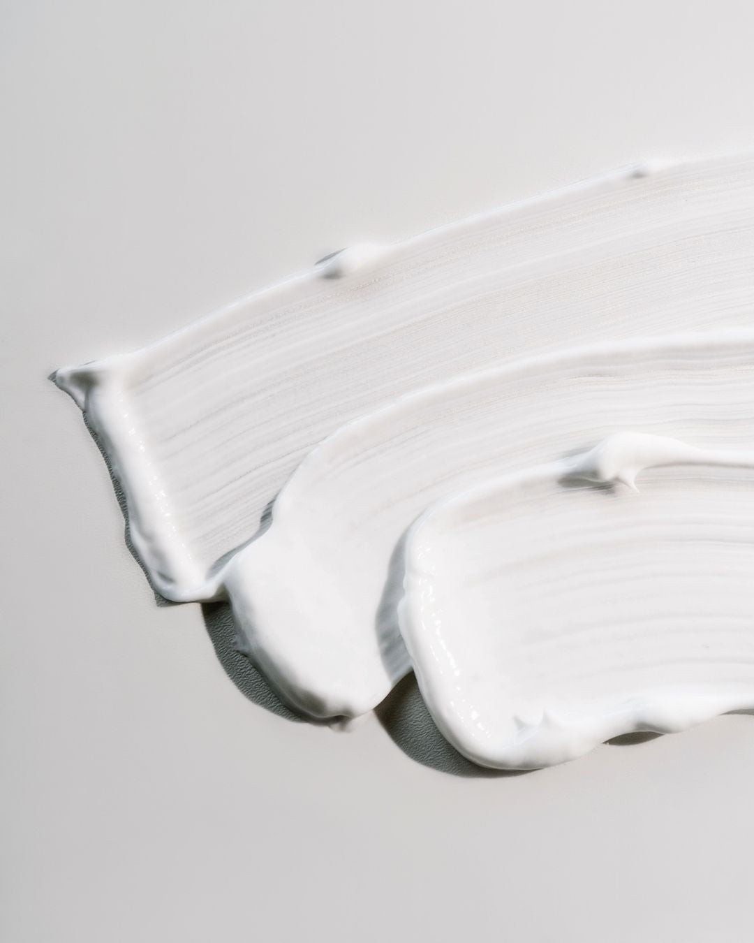 Texture swatch of KALME Night Repair Cream showing the rich, creamy white cream designed to deeply moisturise rosacea-prone skin overnight