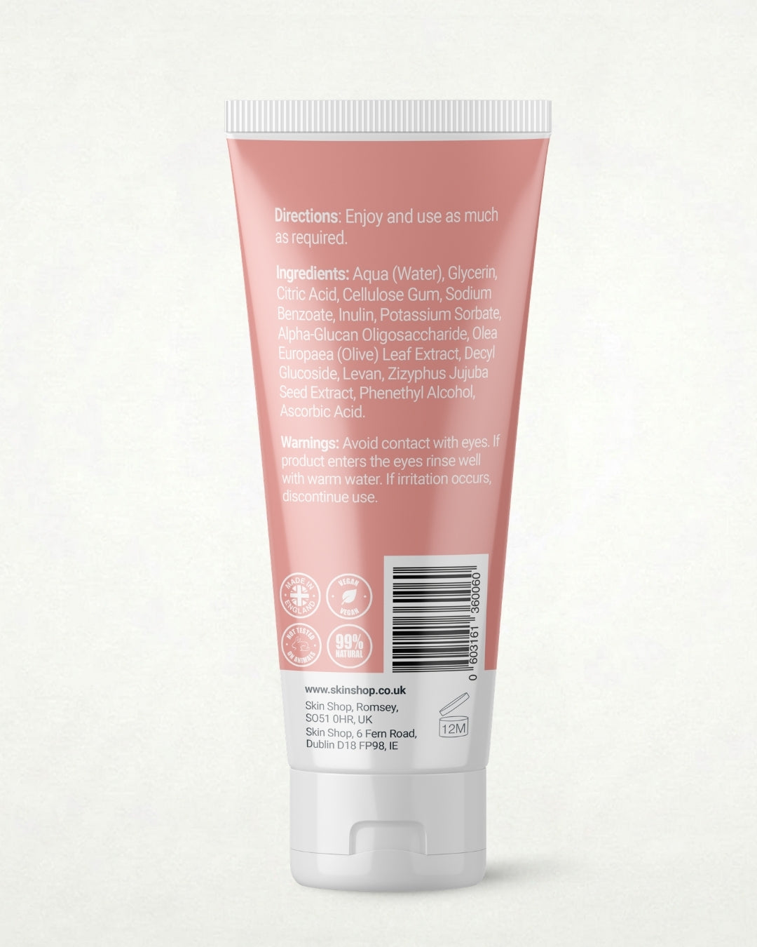The back of a pink squeeze tube of in2mate lubricant for intimate skin with white cap, showing product directions, ingredients, made in England, Vegan, 99% natural, warnings, and a barcode on a light off-white background.