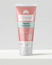 A squeeze tube of in2mate Natural Moisturiser on a light grey surface against a neutral grey background.