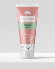 A squeeze tube of In2mate Natural Wash skincare product for intimate cleansing, set against a clean light gray background.