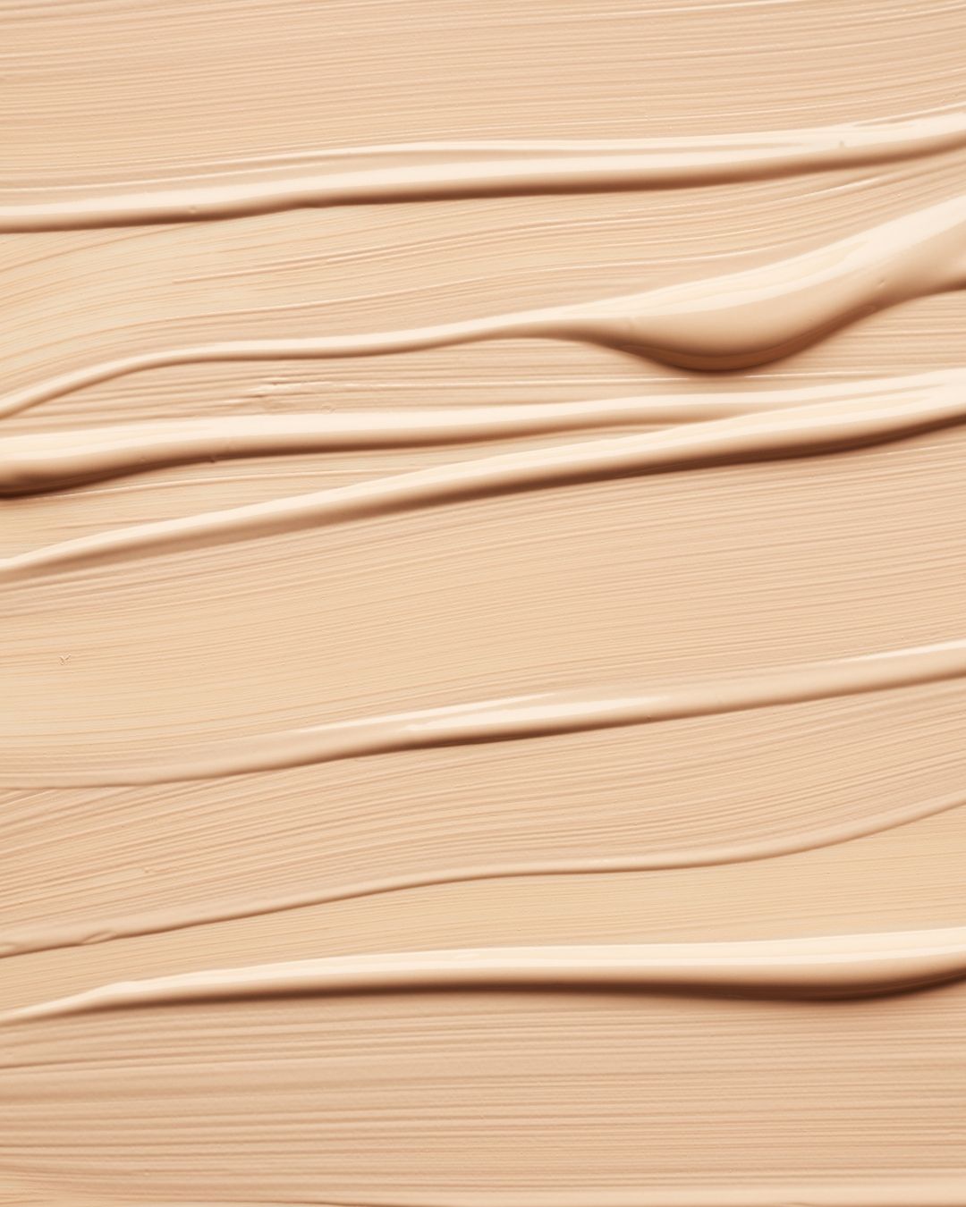 A swatch of Hydrosil Dry Eye Concealer showing its smooth, creamy, fair-to-medium tinted texture