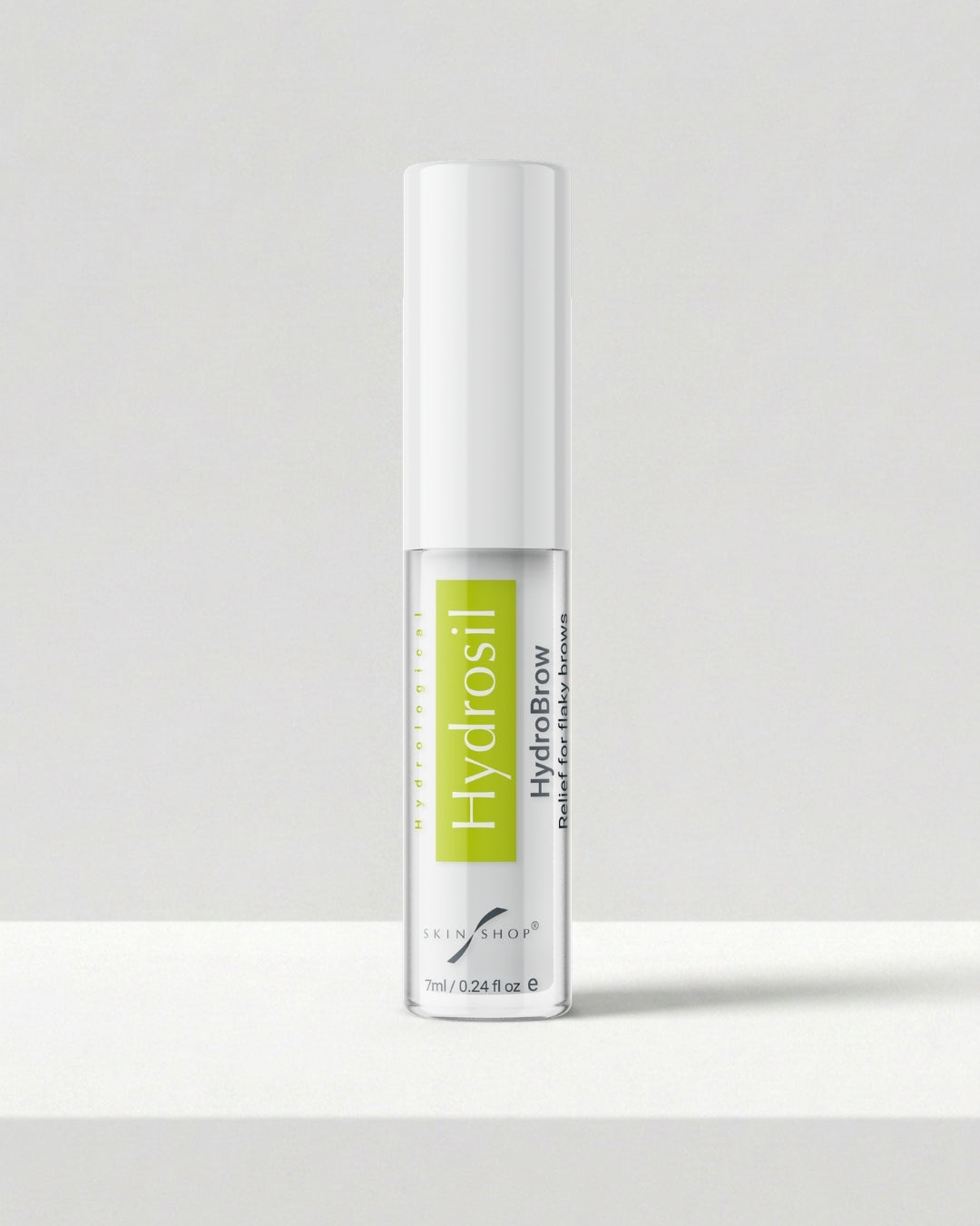 Hydrosil Hydrobrow Serum, a clear 7ml brow serum with a white cap and green Hydrosil label, for dry, flaky brows