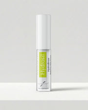 Hydrosil Hydrobrow Serum, a clear 7ml brow serum with a white cap and green Hydrosil label, for dry, flaky brows